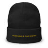 Black knit beanie with yellow Average Is The Enemy text